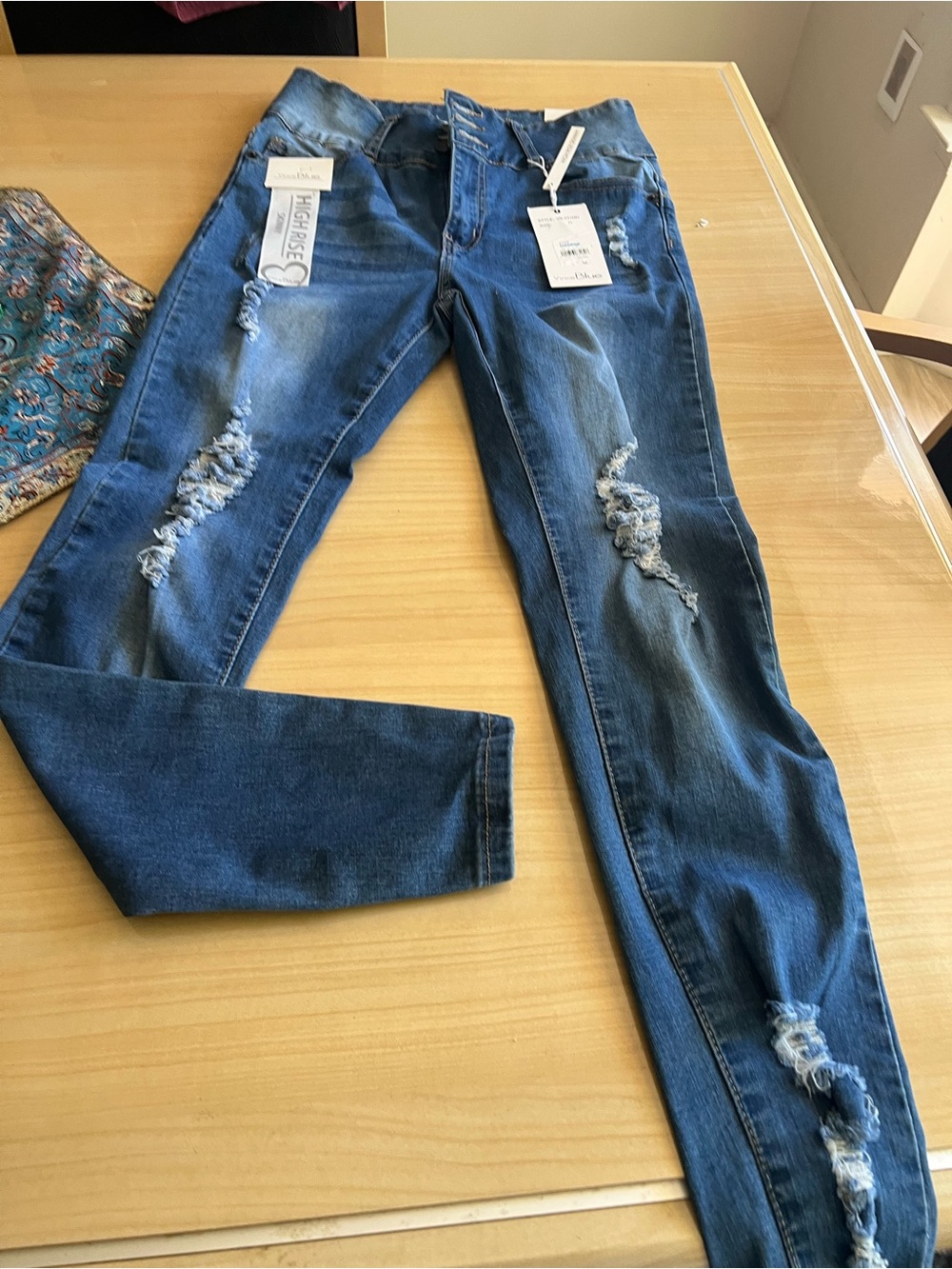 Skinny Distressed Mid-Rise Jeans in Denim Blue